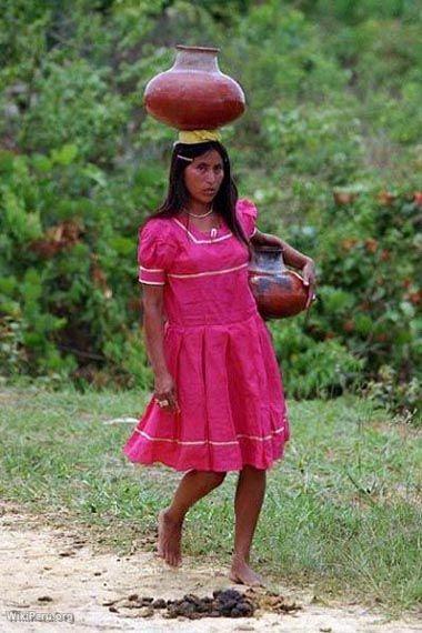 Resident of Lamas with Jugs