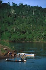 Aguaruna Residents Loading Wood on the Cenepa River