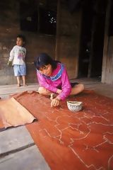 Shipiba Painting a Textile